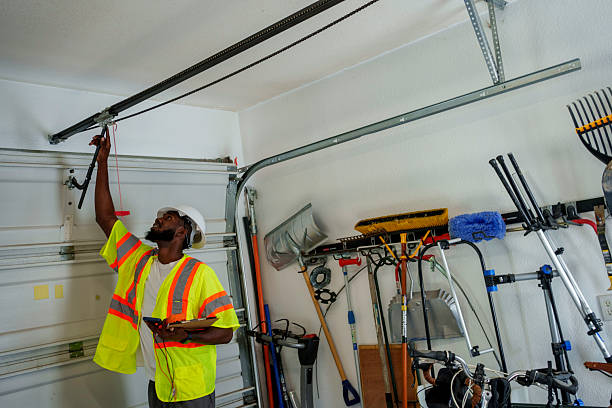 Professional Garage Door Panel Replacement technician working in Ellsworth, KS